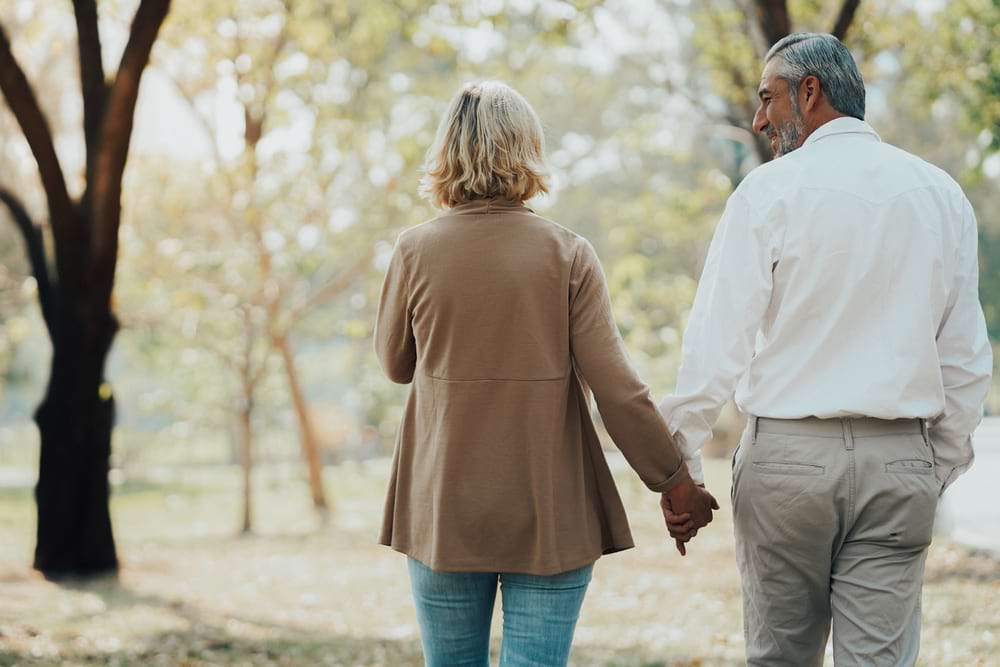 couple walks in nature